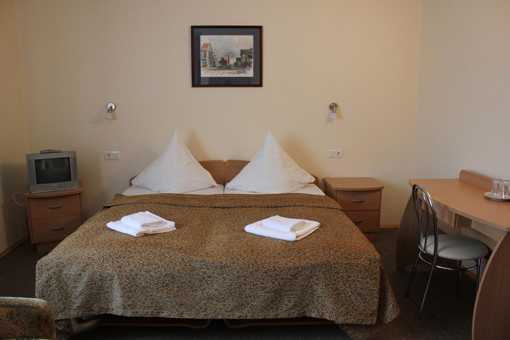Nidos Banga Hotell Rum bild